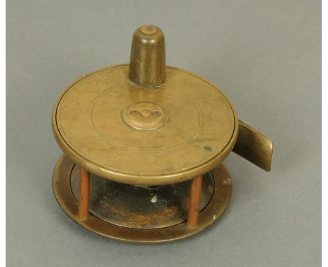 A vintage brass fly fishing reel, WJ Cummins maker Bishop Auckland.  Diameter 3.25".