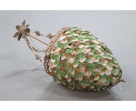 A metal and coloured glass light fitting, green, brown and pearl.  Length +/- 72 cm. 