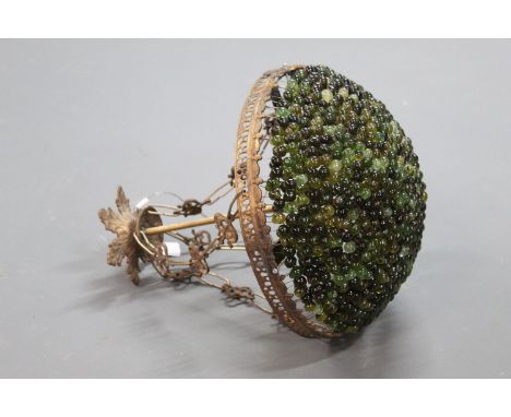 A ceiling hanging glass and metal light fitting, decorated with green glass globules.  44 cm (425).  