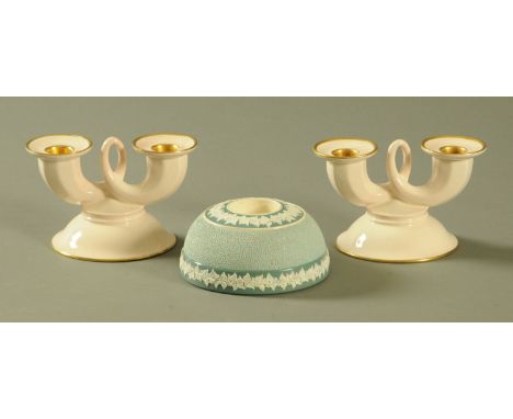 A pair of Carltonware dwarf twin branch dressing table candlesticks, and a Carltonware match striker.