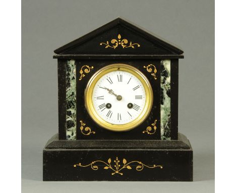 A late Victorian black slate and marble mantle clock, with two train striking movement.  Width 27 cm, height 29 cm. CONDITION