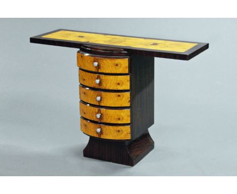 An Art Deco inspired console table, with contrasting dark and light timbers and five drawers with silver coloured handles.  W