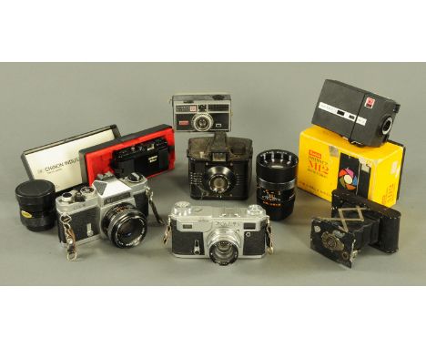 A vintage Russian camera, a Chinon camera, two Kodak Instamatics and various other cameras, lenses, etc. 