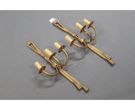 A pair of three branch gilt light fittings.  Length 60 cm (411).