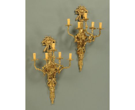 A large pair of brass five branch light fittings, in the Classical style, with bellflower swags.  Height 74 cm. 