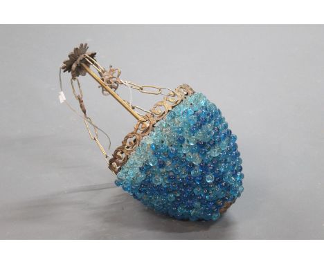 A metal and glass ceiling hanging light fitting, decorated with blue globules.  Height +/- 46 cm. 