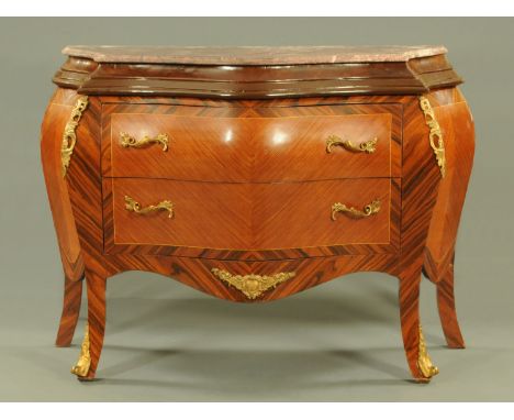 A French style marble topped bombe commode, kingwood with metal mounts.  Width 122 cm.