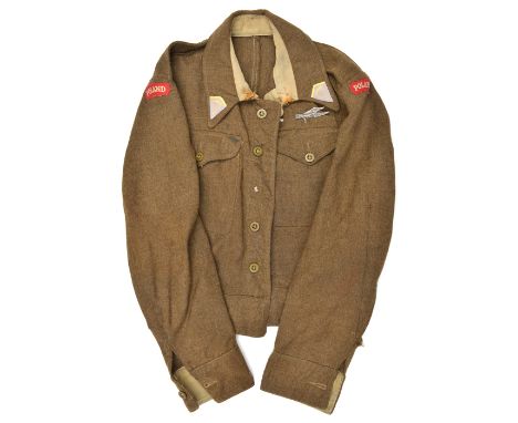 A khaki BD blouse, with white on red “Poland” shoulder titles, triangular collar patches with parachute, pocket lining stampe