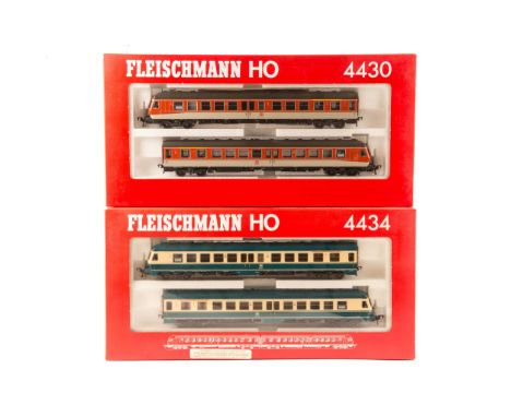 2 Fleischmann HO Diesel Motor Units (4430 and 4434). Set 4430 comprising 2x DB powered DMUs in orange and grey livery. Set 44