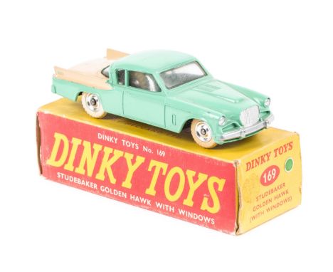 A Dinky Toys Studebaker Golden Hawk (169). A late example in light green and cream, example with dished spun wheels. In a lat