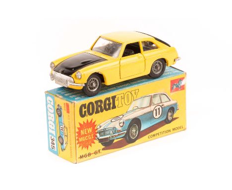 Corgi MGC GT (345). In yellow with black bonnet and boot lid and interior. Boxed, minor wear, racing numbers missing. Vehicle