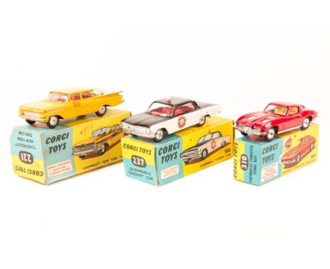 3 Corgi Toys. A Chevrolet New York Taxi (221). An Oldsmobile Sheriff Car (237). A Chevrolet Corvette Sting Ray (310). All box