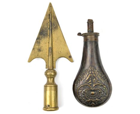 A copper powder flask, of bird in foliage type, “Patent” brass top (AF), 7½” overall; a brass staff head, of arrow head form 