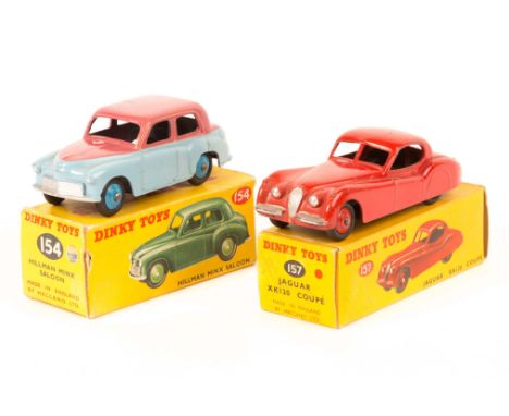 2 Dinky Toys. Hillman Minx Saloon (154), two tone example in light blue and cerise with mid blue wheels. Plus a Jaguar XK120 