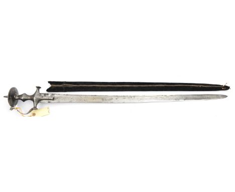 An 18th century tulwar hilted Indian sword,  very slightly curved broad blade 33”, with narrow back fuller and double edged a