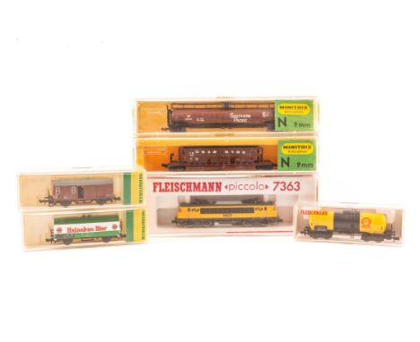 10 N gauge locomotives and freight wagons etc by Fleischmann and Minitrix. A DB class 050 2-10-0 tender locomotive 050-058-7 