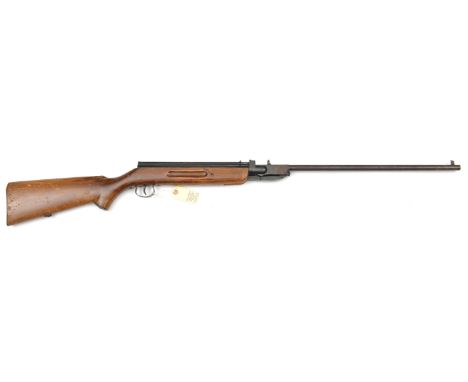 A .22” Jelly break action repeating air rifle, number 1082, with full length spring loaded tubular magazine above the air cha
