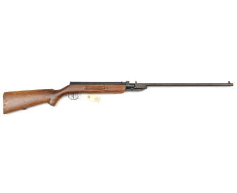 A .22” Jelly break action repeating air rifle, number 1082, with full length spring loaded tubular magazine above the air cha