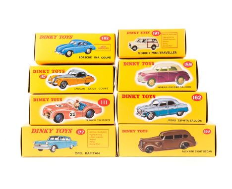 8 Atlas Dinky Toys. Packard Eight Sedan (39) in dark green, Triumph TR2 Sports (111) in pink with blue seats and wheels, RN28