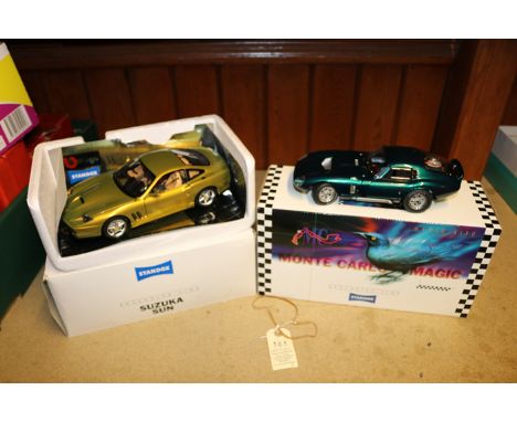 2 1:18 limited issue promotional issue models made for Standox automotive paint manufacturer. Both models have been professio