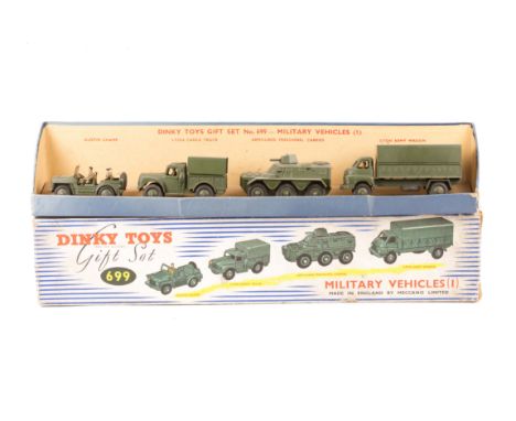 A Dinky Toys Gift Set (699) Military Vehicles (1). Comprising Austin Champ, 1-Ton Cargo Truck, Armoured Personnel Carrier and