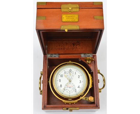 A high quality Russian chronometer, gimbal ring mounted inside highly polished brass mounted mahogany case with handles, whic