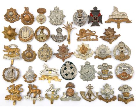 35 infantry cap badges, including Queens with title, Buffs, Leicester, Cheshire, R Welch Fus, Worcester, Border, Dorsetshire,