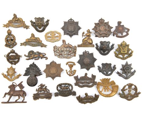 4 officers bronze cap badges:  R Fus, Worcester (one blade missing), Hampshire and RAMC (1 blade missing); 18 similar infantr