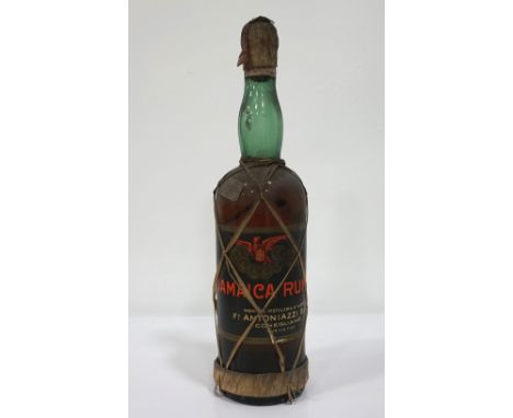 JAMAICA RUM CA. 1950A rare bottle of Jamaica Rum bottled for Filli Antoniazzi S.p.A., Conegliano, which we believe was bottle