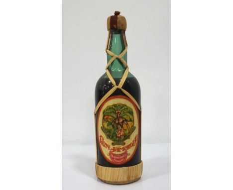 RON JAMAIQUE CIRCA 1940A great older bottle of Ron Jamaique bottled by Euardo Garriga, Badalona which we estimate as being fr