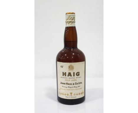 HAIG GOLD LABEL - SPRING CAPA bottle of the famaous Haig Gold Label Blended Scotch Whisky from the 1960's with the lovely spr