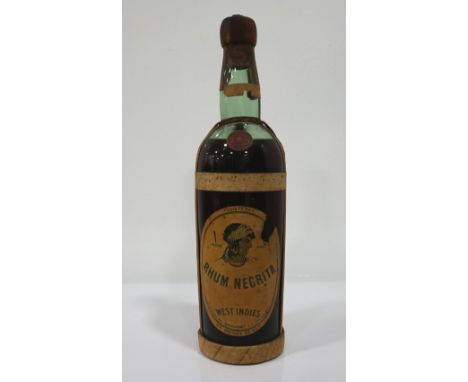 RHUM NEGRITA (OLD NICK RUM) CA. 1920'SA very old bottle of Rhum Negrita which we estimate as being an example from the 1920's