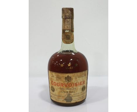 COURVOISIER TROIS ETOILES LUXE COGNAC CA. 1950'sA bottling from the early 1950's from Courvoisier.  "By appointment Purveyors