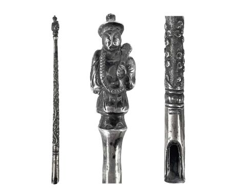 A Chinese silver dip-pen, by Wang Hing.  Of cylindrical tapering form and embossed with flowering and fruiting vines, marked 