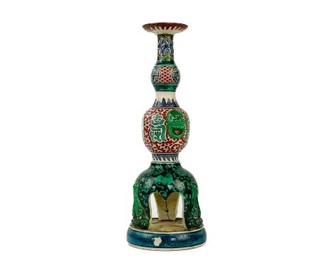 A Japanese Ao de Kutani candlestick, late 19th century. With Matsuyama Gama mark, height 30cm, diameter of base 11cm.