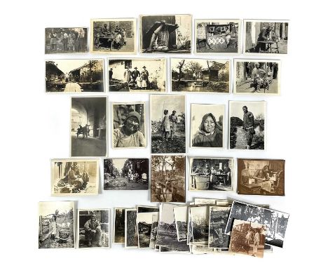 A collection of early 20th century photographs of Shanghai, China, Japan and Burma. Forty b+w photographs, depicting life in 