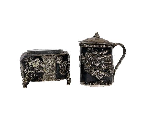 A Chinese export silver condiment pot and salt by Wang Hing. The lidded condiment embossed with a dragon and with cast bamboo