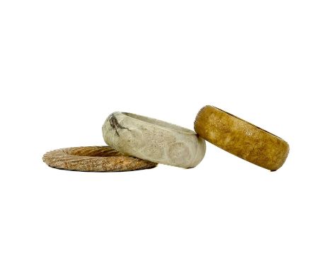 A calcified jade bangle in Liangzhu culture style. Diameter 8.5cm together with a calcified jade bangle with repeating archai