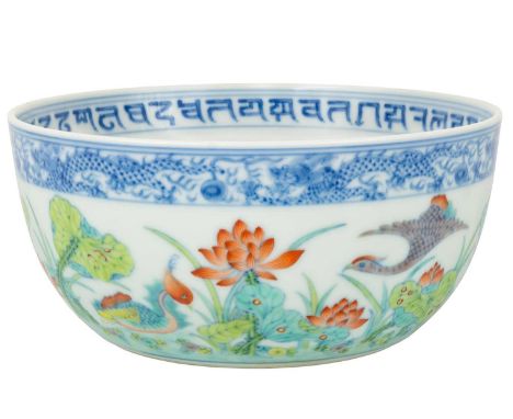 A Chinese doucai porcelain bowl, Daoguang seal mark. The interior decorated with birds and foliage, the exterior with a blue 