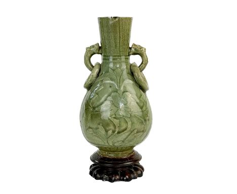 A Chinese celadon crackle glazed vase,  Previously converted to a lamp base, with attached carved wood stand, total height 29