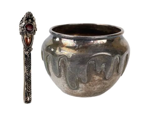 A Chinese silver pot and a dragon tie pin. The small ovoid pot with drip embossed design on a chased ground, stamped characte