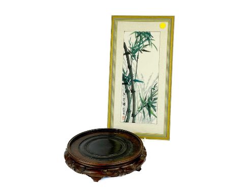 A Chinese hardwood vase stand, early 20th century. Inner diameter 23cm, height 6cm and a Chinese framed watercolour depicting