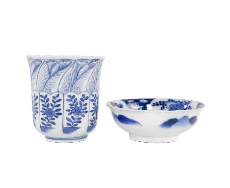 A Chinese blue and white porcelain cup, 19th century.  In the Kangxi style, height 10.5cm, diameter 9.5cm and a Japanese blue