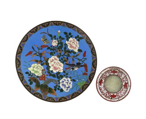 A Chinese carved jade and enamelled dish, 20th century. Diameter 11cm and a Japanese cloisonne charger, 19th century. (2)