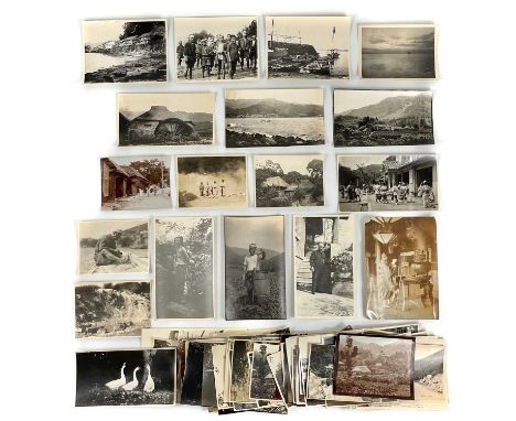 A collection of early 20th century photographs of China, Japan and Burma. Over ninety b+w photographs, depicting life in Chin