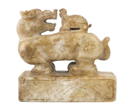 A Chinese carved jadeite seal, 20th century. In the form of a lion dog with turtle on his back, height 9cm, width 9.5cm, dept