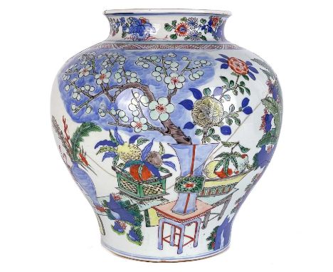 A Chinese porcelain wucai enamelled and painted vase, 18th century.  Decorated with precious objects and trees, height 26.5cm