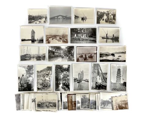 A collection of early 20th century photographs of Soochow and Shanghai, China. Over sixty b+w photographs, depicting life in 