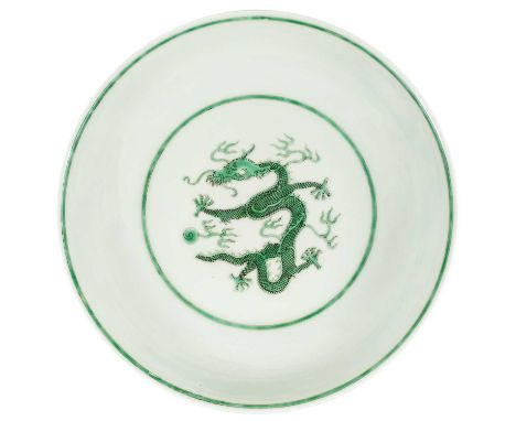 A Chinese green glazed porcelain dragon dish, Guangxu mark. Height 4.5cm, diameter 18.5cm.No chips, cracks or loss of decorat