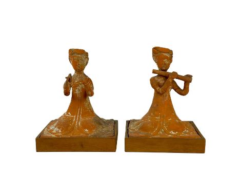 A pair of Chinese terracotta tomb musicians, Tang style. Each on square wooden stands, height of tile 18cm, width 13cm, depth